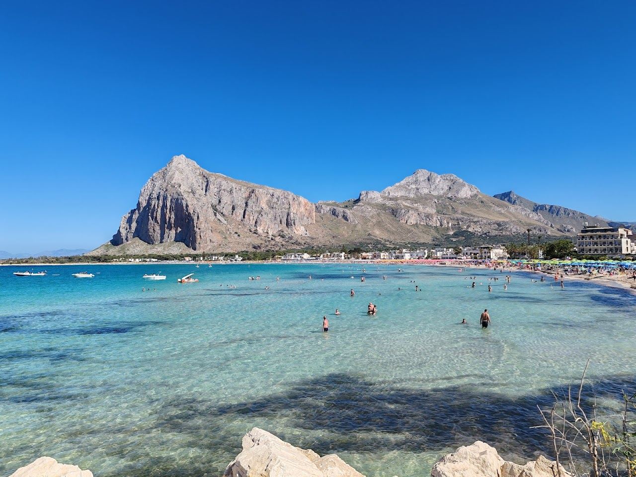 Long sandy bay and clear water below Monte Monaco at San Vito Lo Capo in Sicily