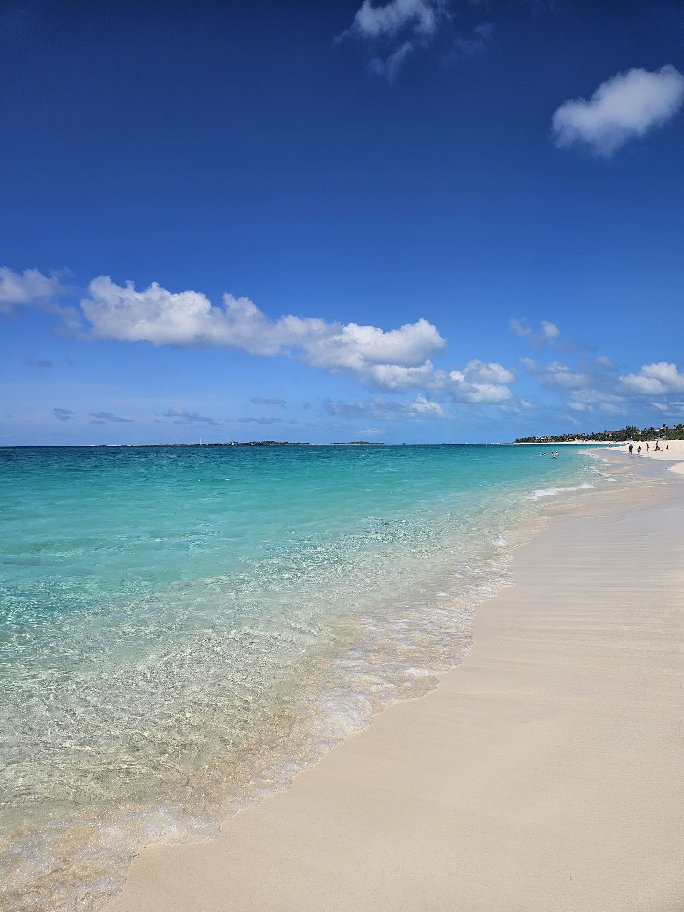 Pale sand and turquoise water at Cabbage Beach on Paradise Island in the Bahamas