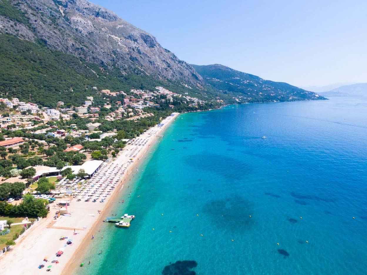 White pebble bay and clear blue water at Barbati on the northeast coast of Corfu