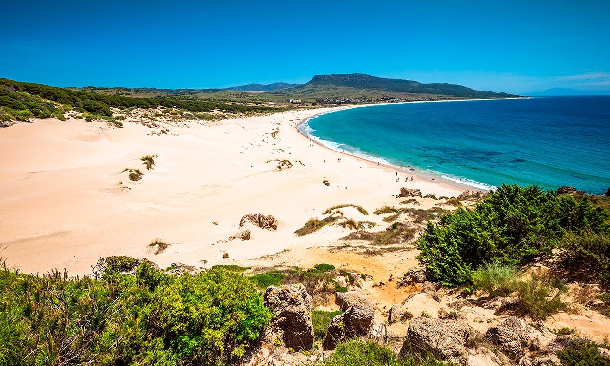 The great protected dune and pale sand at Bolonia beach near Tarifa on the Costa de la Luz at golden hour