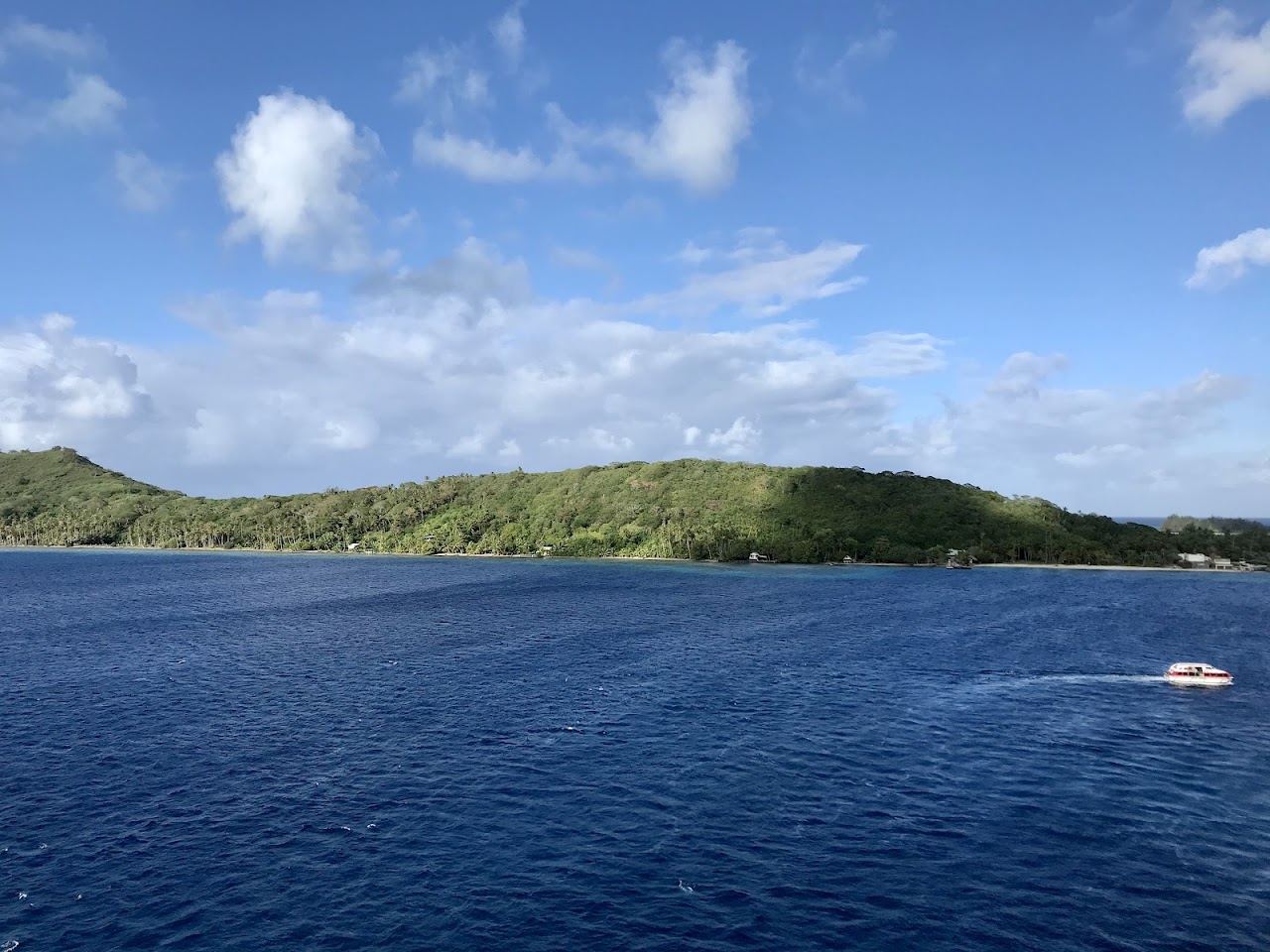 The lagoon and Motu Toopua on the west side of Bora Bora with Mount Otemanu beyond