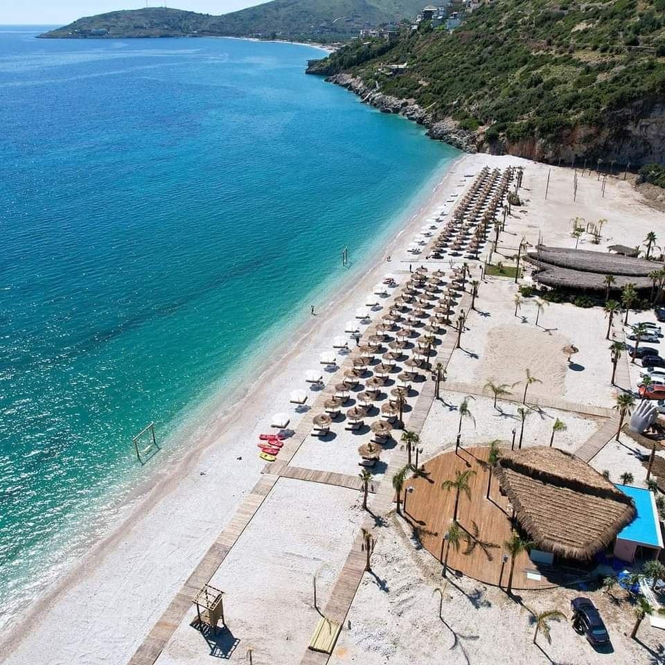 The long shoreline and olive backed hills at Borsh on the southern Albanian Riviera
