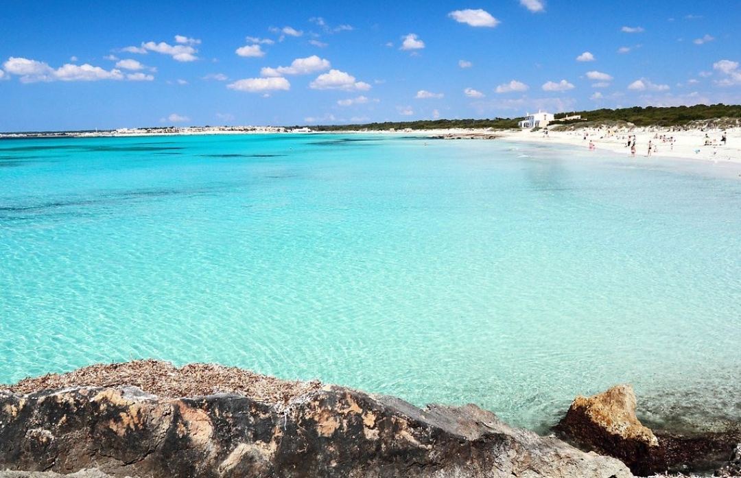 The wild dunes and shallow clear water of Es Trenc in Mallorca
