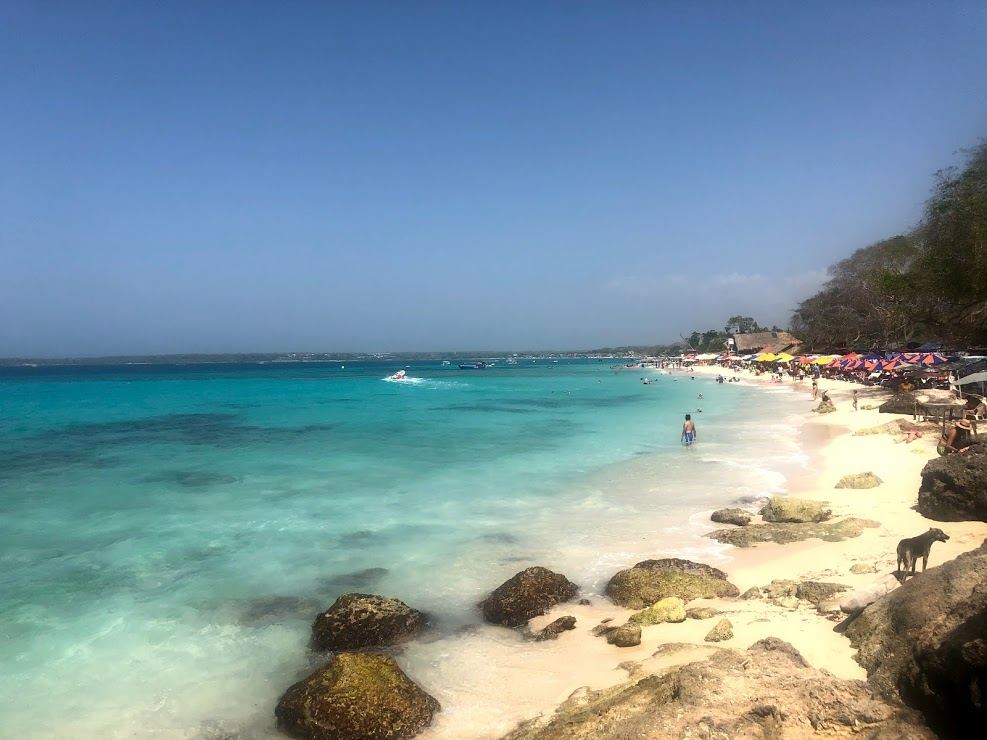 White sand and shallow turquoise Caribbean water at Playa Blanca on Isla Baru near Cartagena