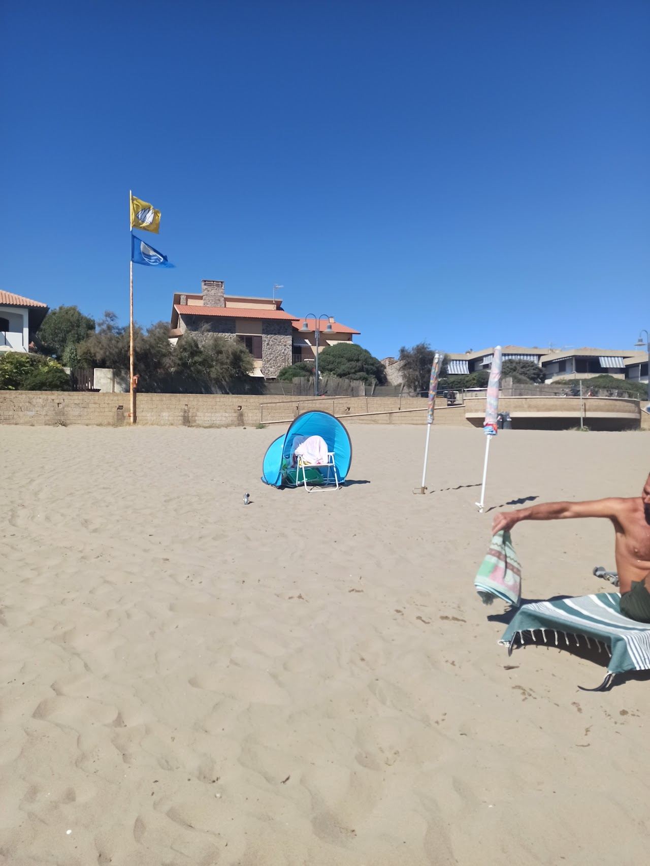 The medieval old town above the beach and harbour of Castiglione della Pescaia on the Maremma coast of Tuscany