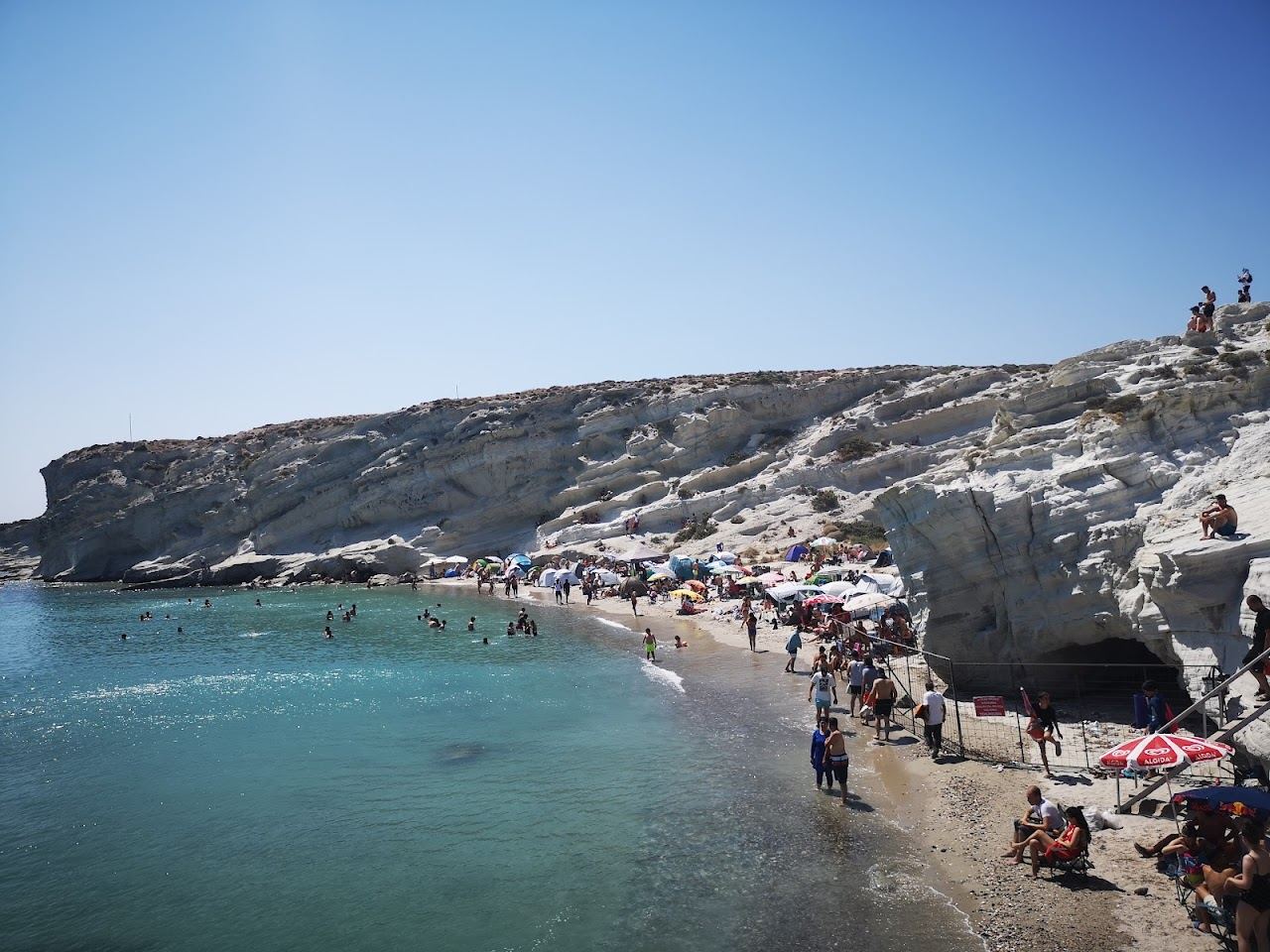 The white rock formations and crystal clear water of Delikli Koy cove near Alacati and Cesme in Turkey