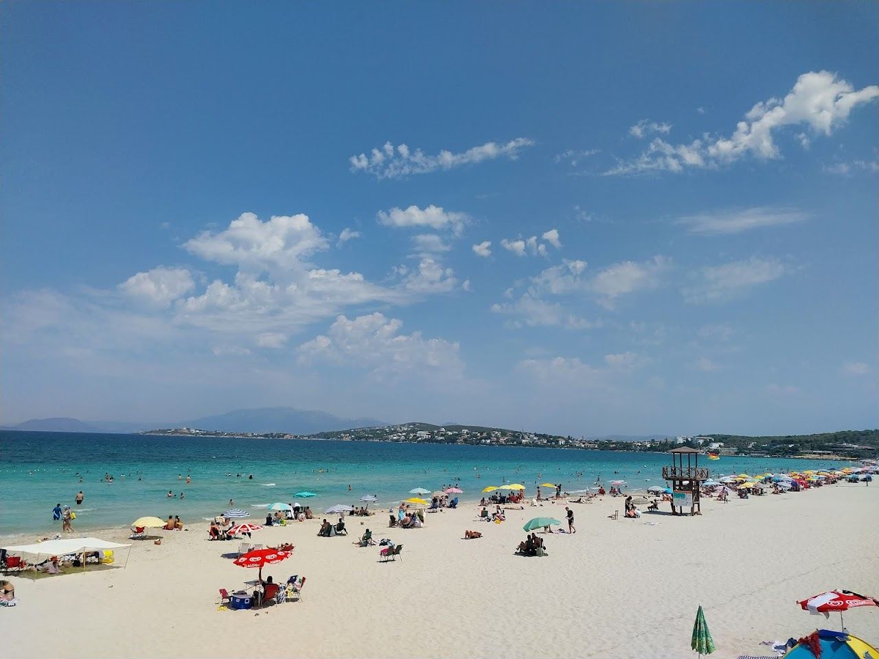 The long shallow bay of Ilica Beach in Cesme with soft white sand and warm turquoise water near Izmir in Turkey
