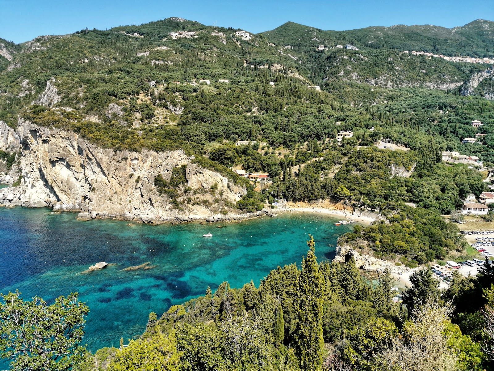 Green headlands and clear water at a cove in Corfu