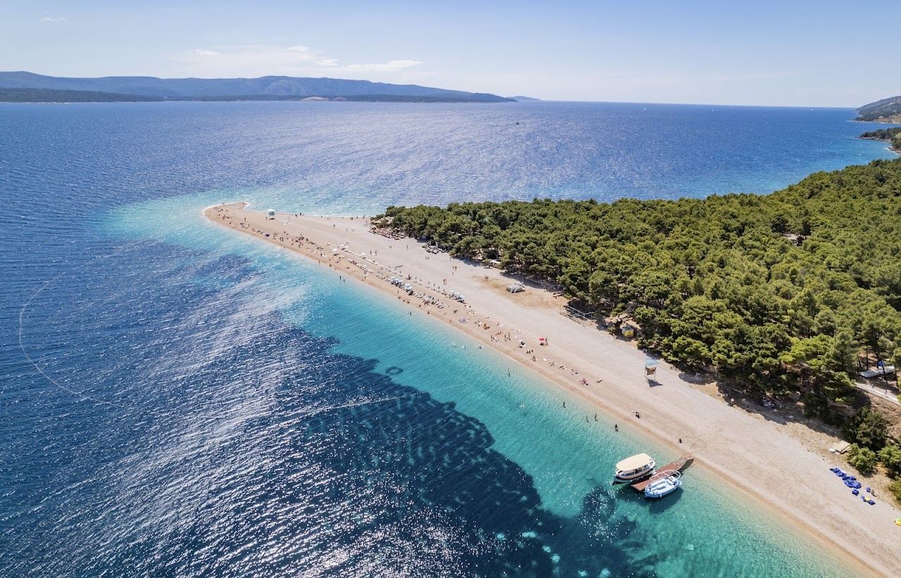 The pointed pebble spit of Zlatni Rat beach at Bol on Brac