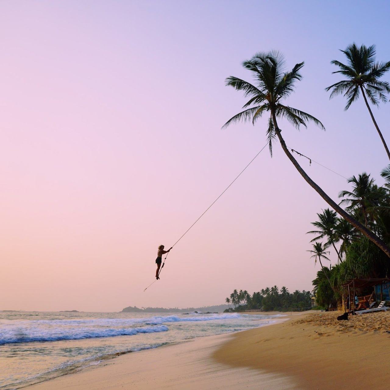 Dalawella Beach turquoise reef protected bay with palms near Unawatuna Sri Lanka