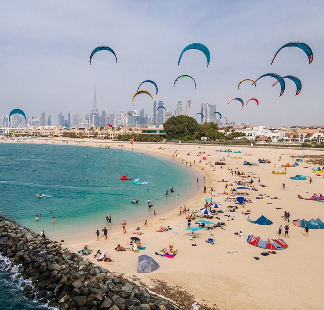 Soft sand and calm Gulf water at Kite Beach in Jumeirah, Dubai