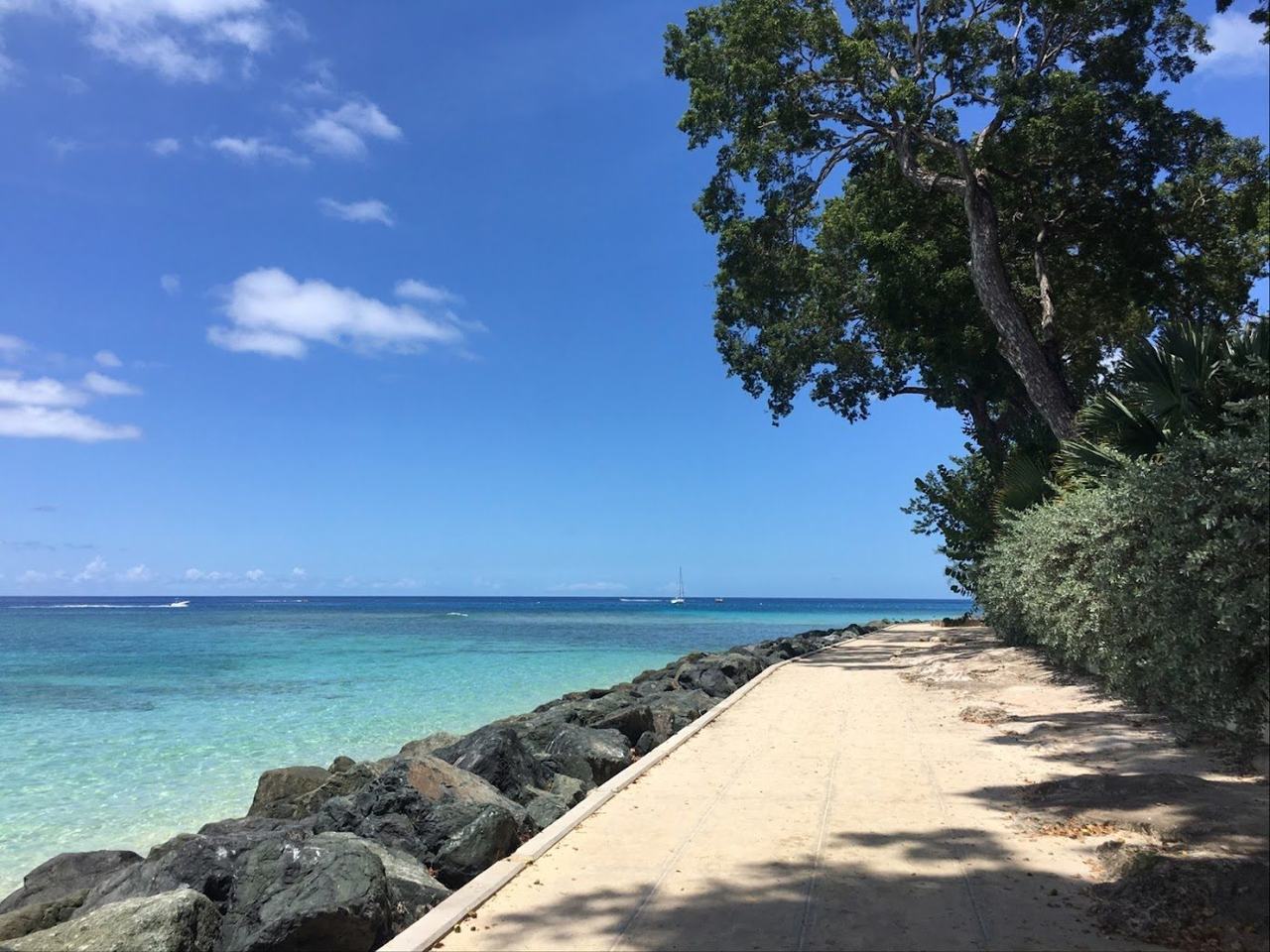 Calm clear water and pale sand at Folkestone Beach and marine park near Holetown Barbados