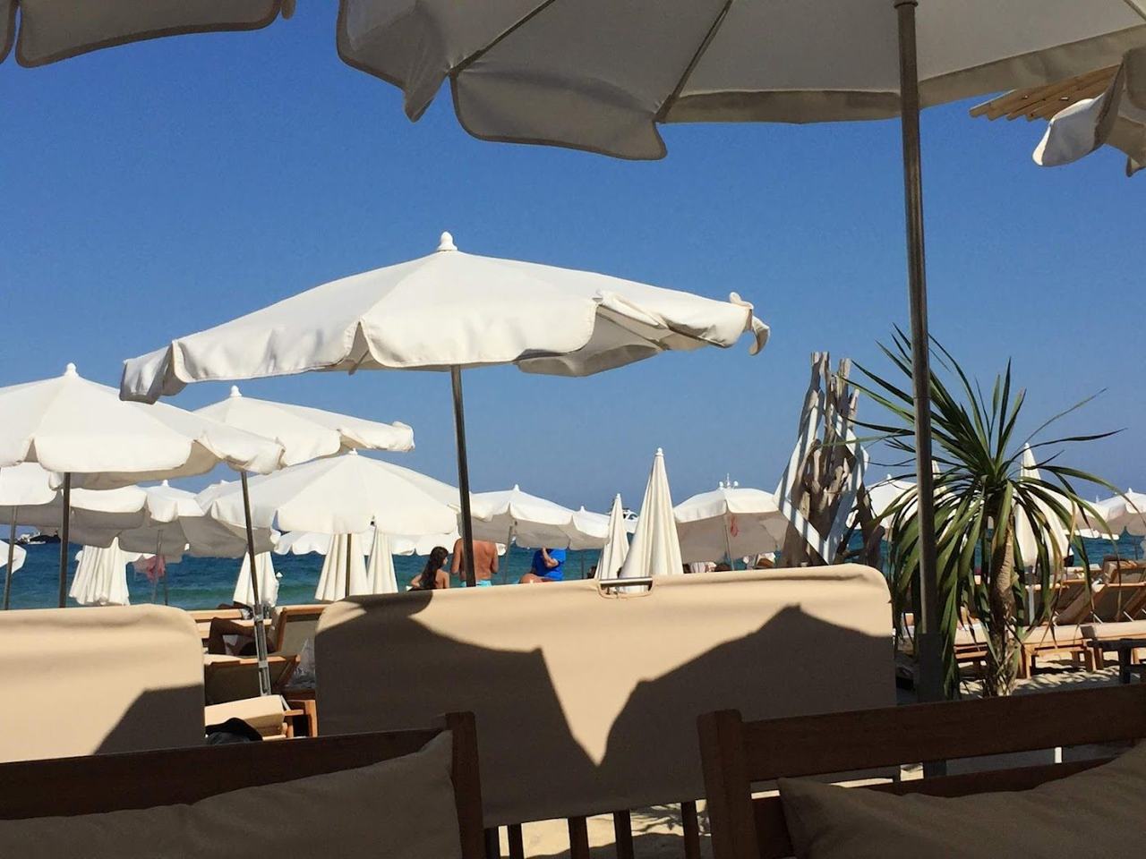 Sunbeds and umbrellas at a beach club on Pampelonne near Ramatuelle on the French Riviera