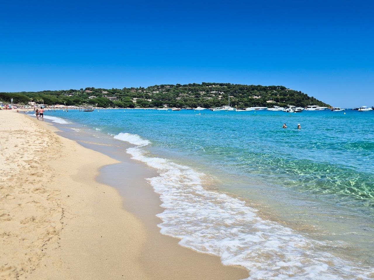 Blue water and a curving bay on the French Riviera coast