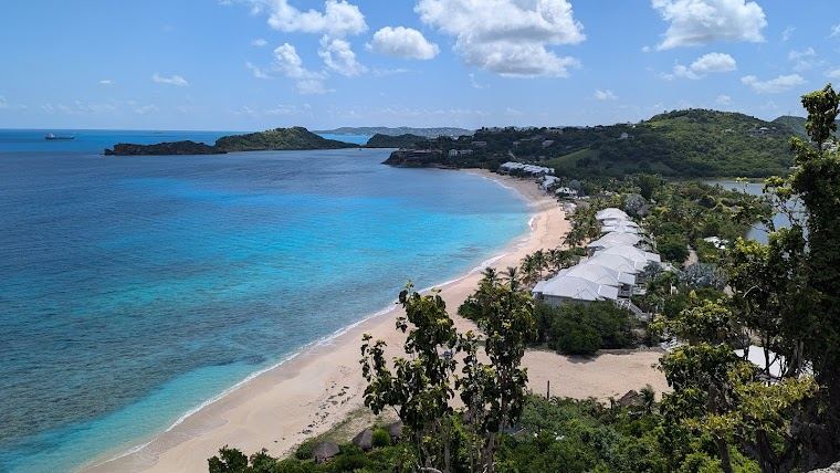 The pale sand and open sea of Galley Bay on the northwest coast of Antigua