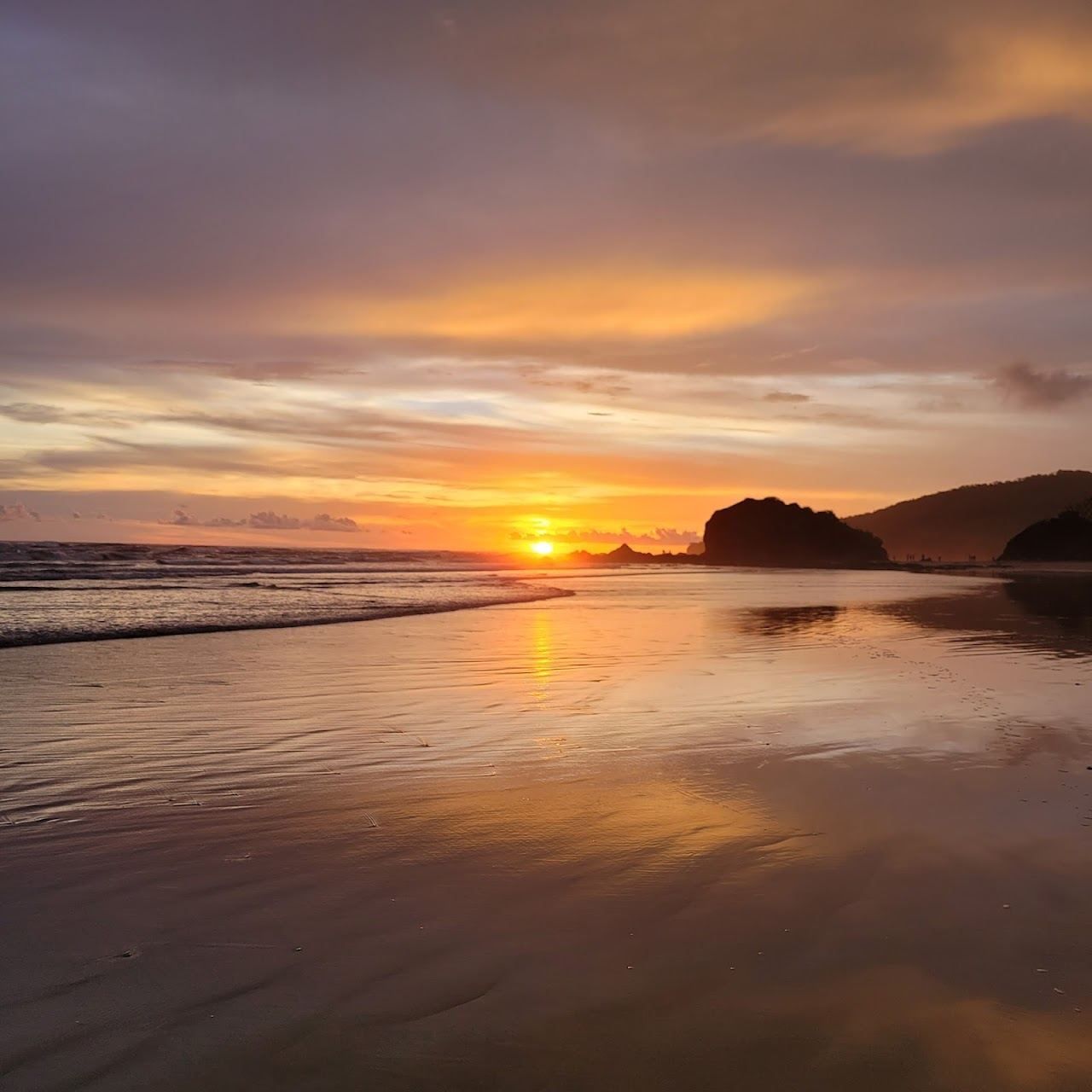 Wild empty sand and green headlands on a secluded Guanacaste beach