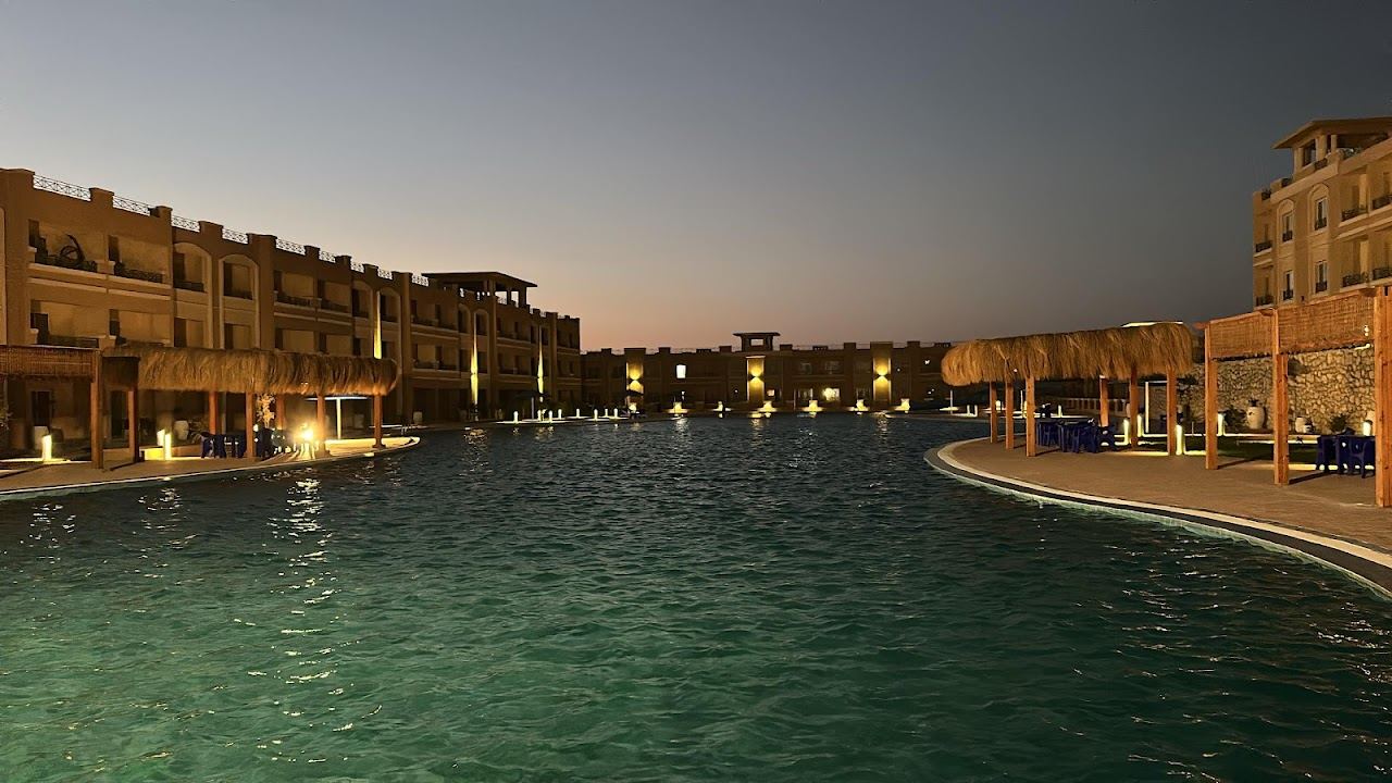 The warm clear Red Sea and sandy shore of the bay at Sahl Hasheesh near Hurghada in Egypt in bright winter light