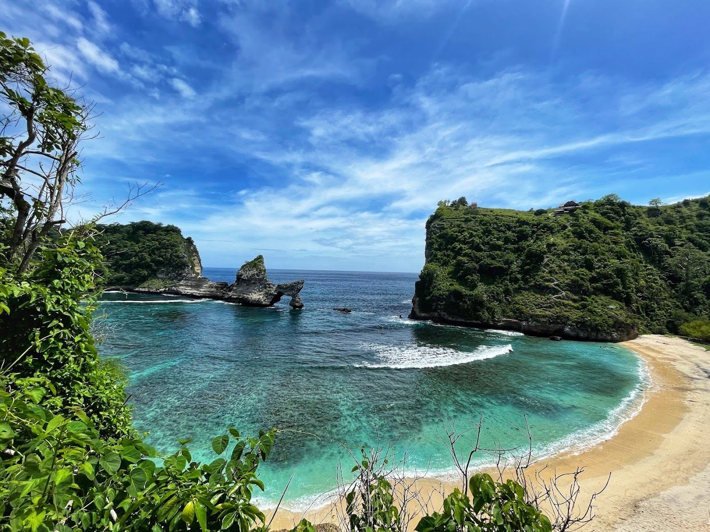 The cliffs and turquoise water of the Nusa Penida coast in Bali, Indonesia