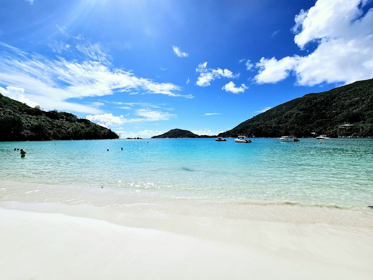 The calm marine park bay of Port Launay on northwest Mahe in the Seychelles