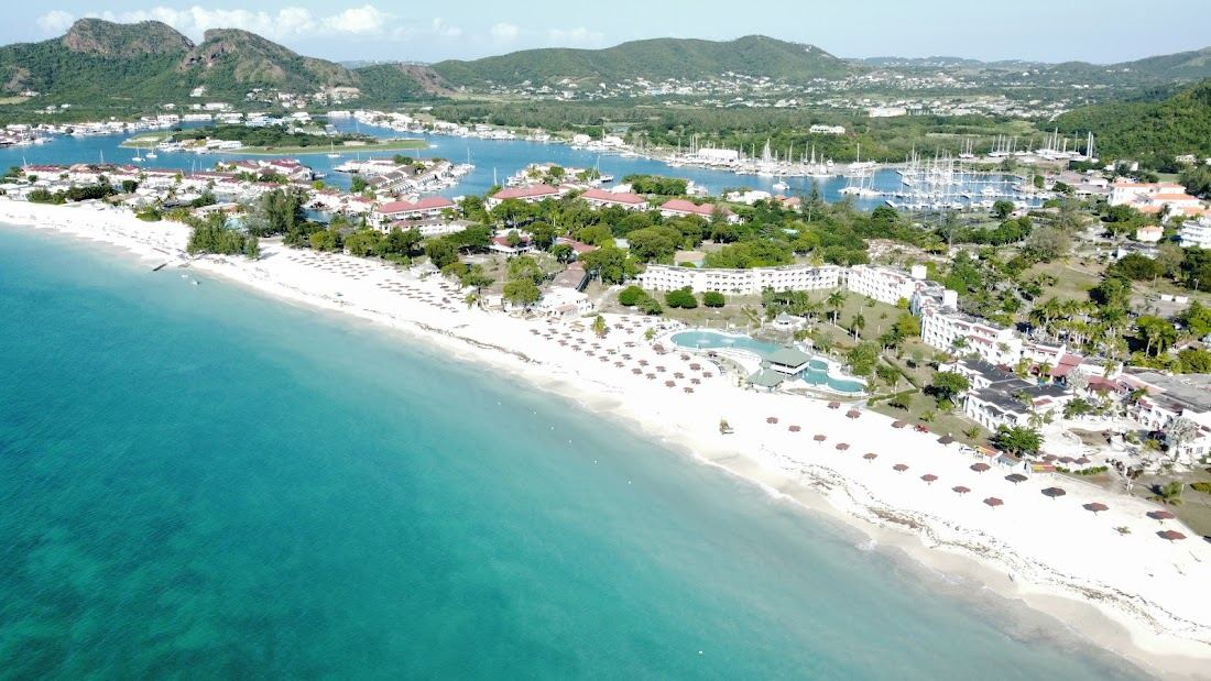 The mile of white sand and calm water at Jolly Beach on Antigua's west coast