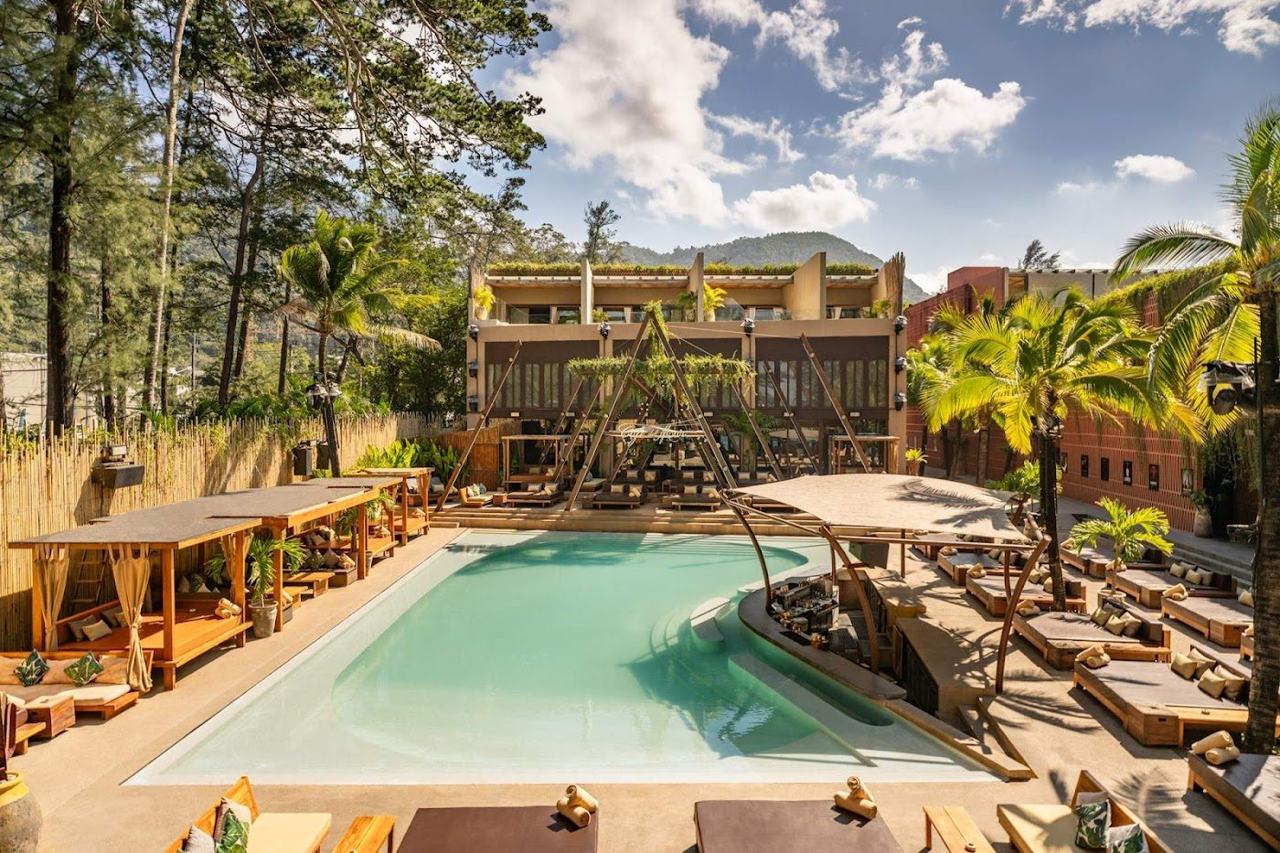 Pool and daybeds at Cafe del Mar beach club at the north end of Kamala Beach