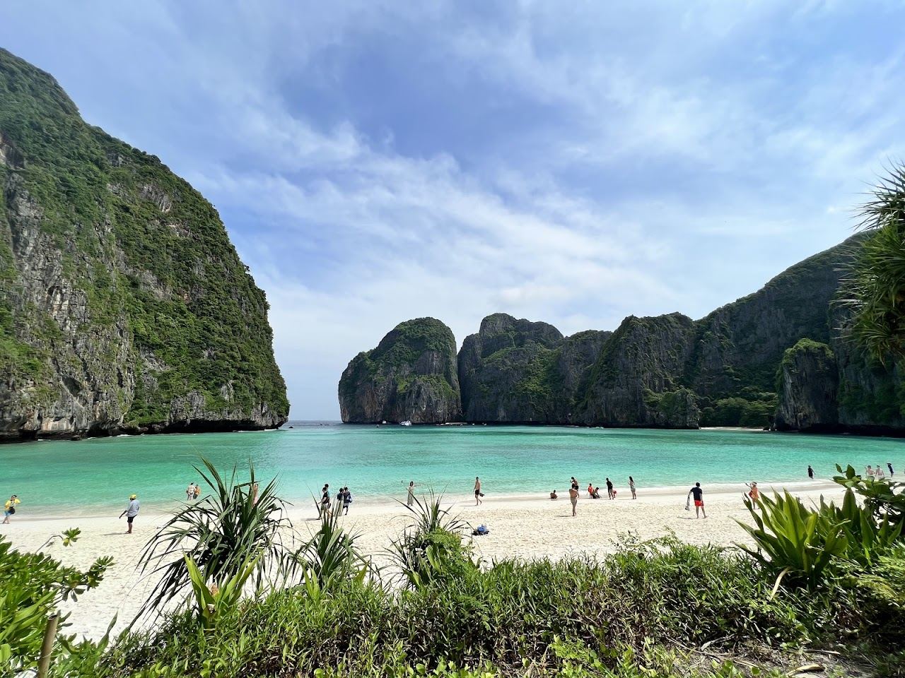 White sand cove ringed by towering cliffs at Maya Bay on Phi Phi Leh in Krabi