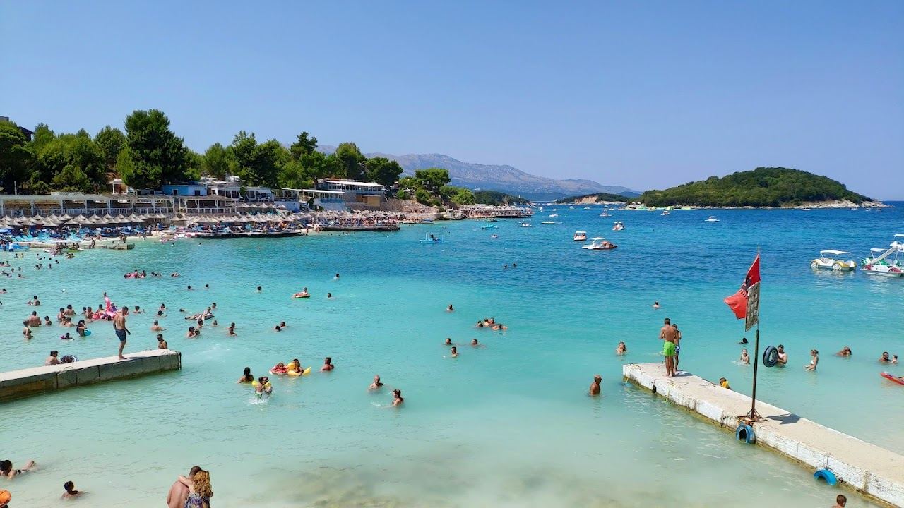 Turquoise shallow bay and small offshore islets at Ksamil on the southern Albanian Riviera