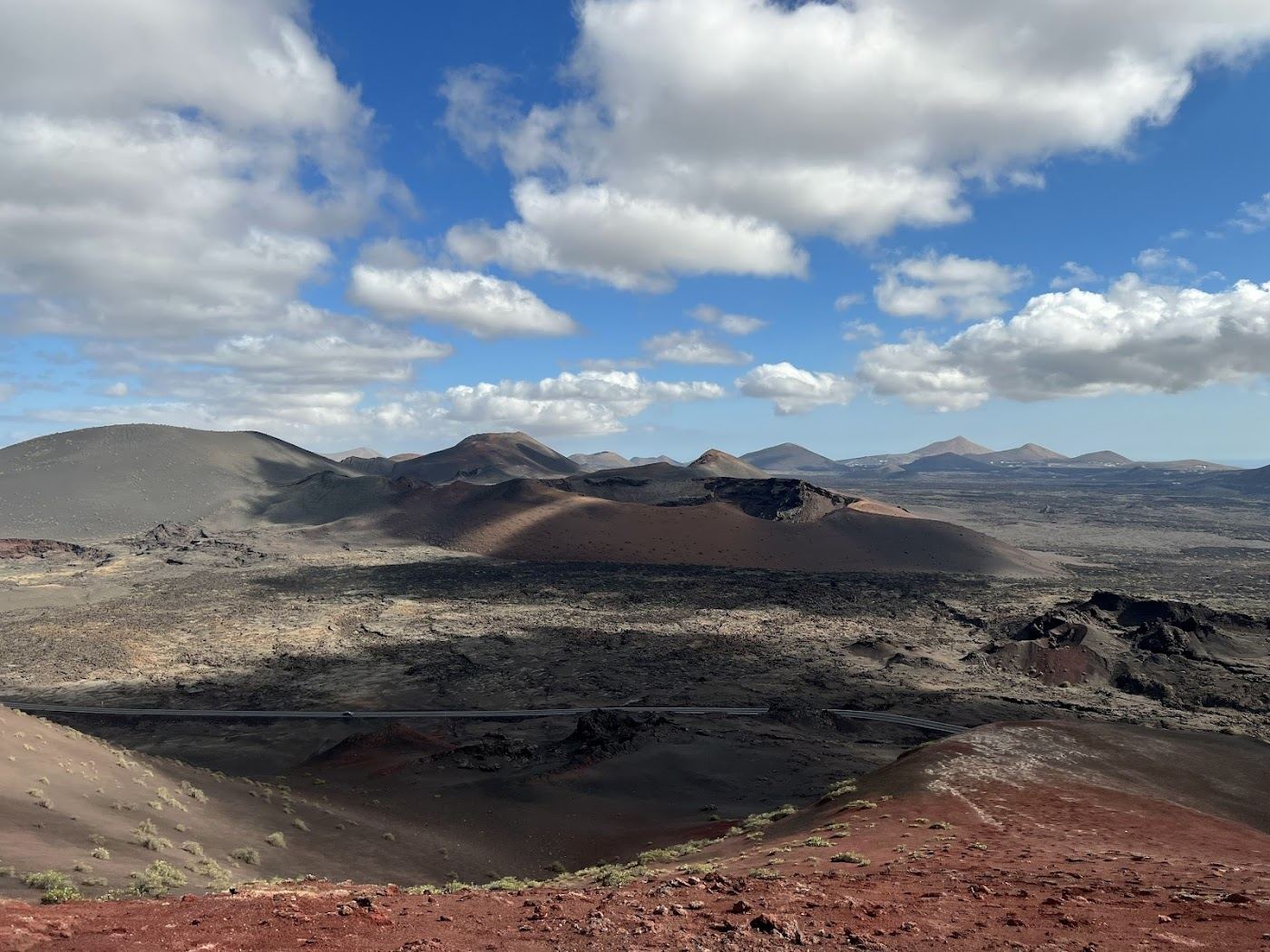 Volcanic coastline and golden beach in Lanzarote in the Canary Islands