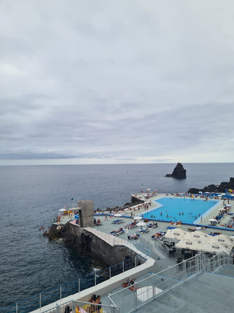 Saltwater pools and sea access decks at the Lido bathing complex on the Funchal seafront in Madeira