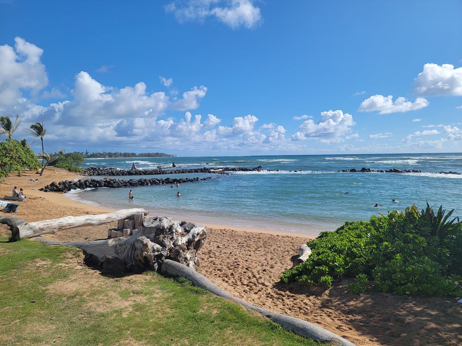 The calm rock walled swimming ponds of Lydgate Beach on the east side of Kauai