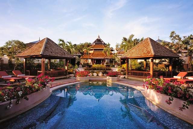 Calm shallow resort cove and groomed sand suited to families on Mactan Island in Cebu Philippines