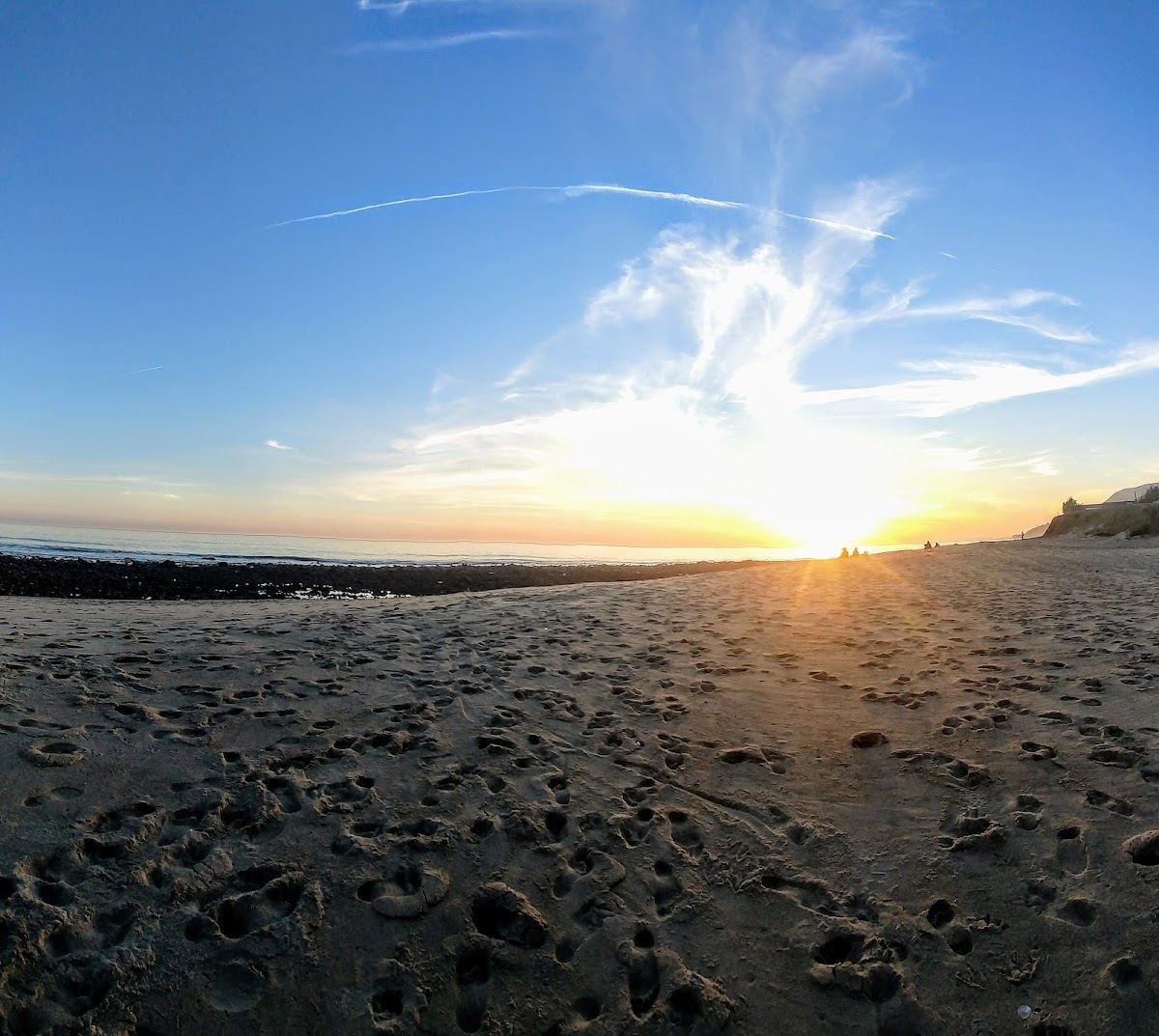 The surf point at Topanga Beach with the eastern Malibu coast behind