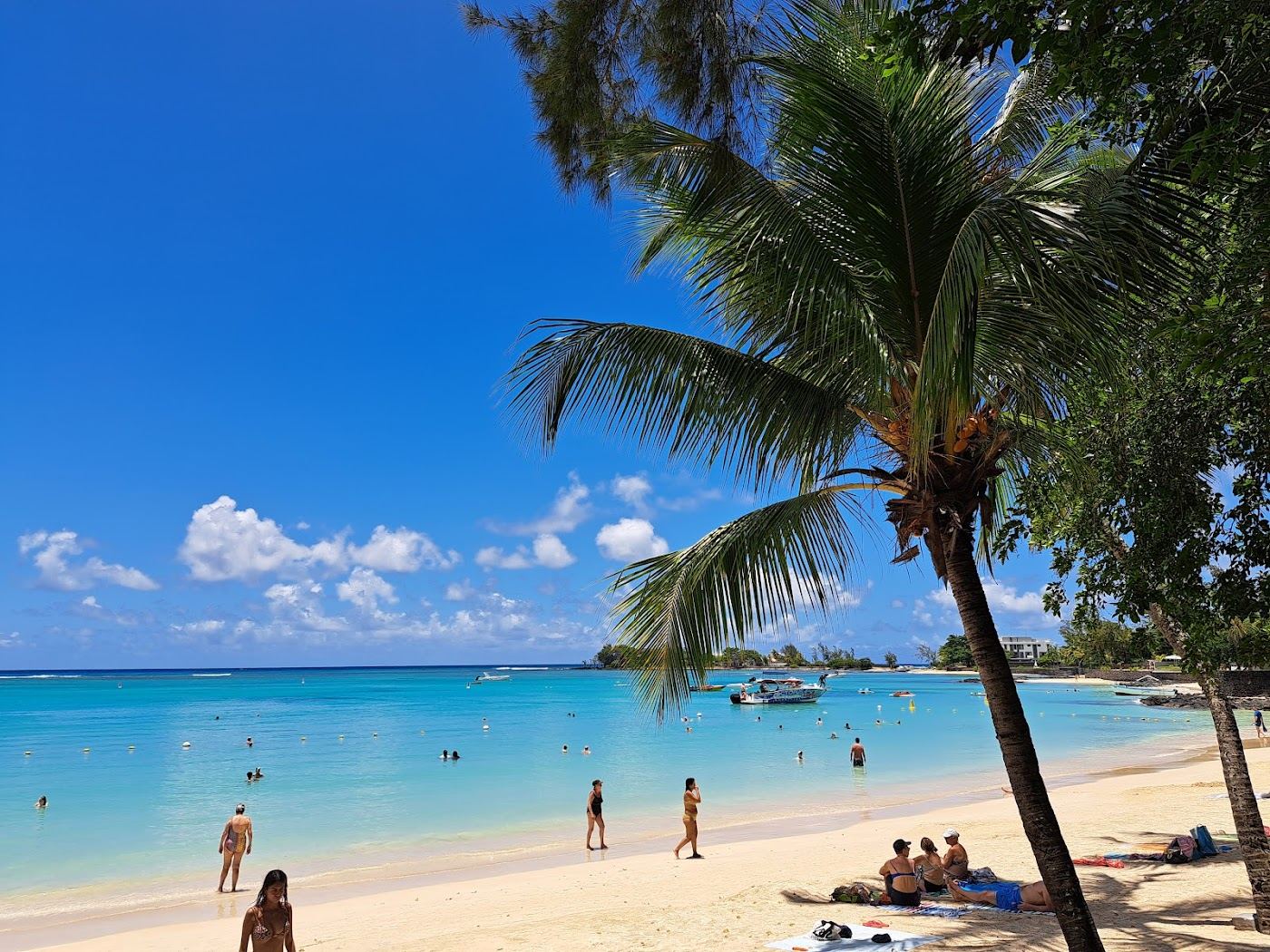 Pale sand and calm turquoise water at Pereybere beach in northern Mauritius