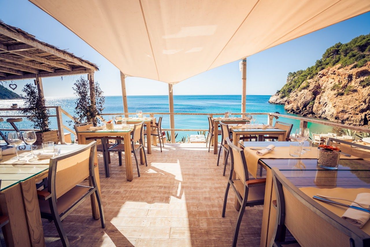 Cliffside terrace above the cove at Amante on Ibiza