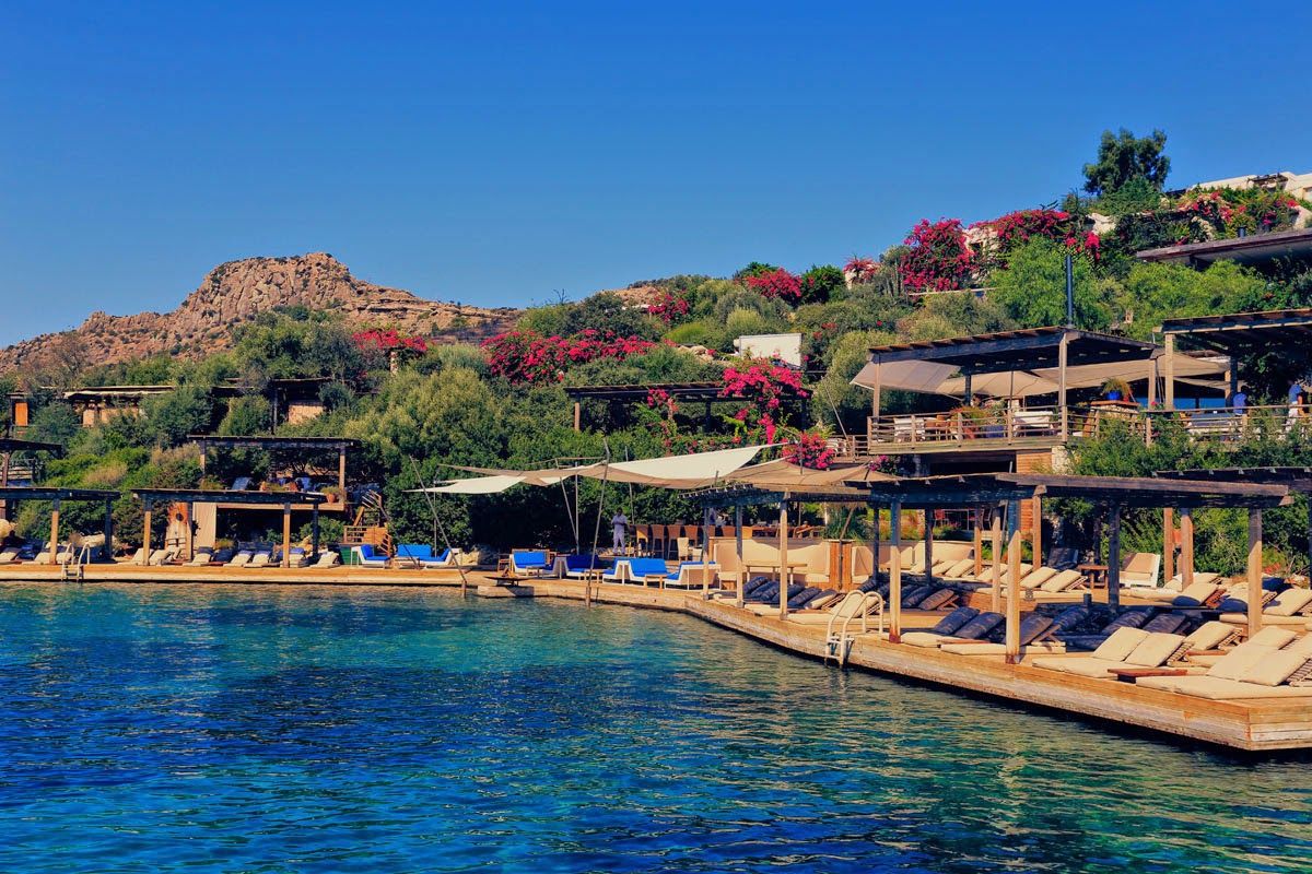 The jetty and terraced restaurant above the bay at Macakizi in Turkbuku, Bodrum