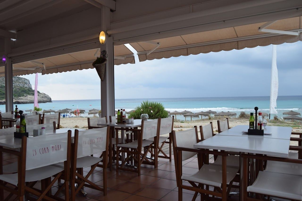 Beachfront restaurant terrace on the sand at Son Bou in Menorca