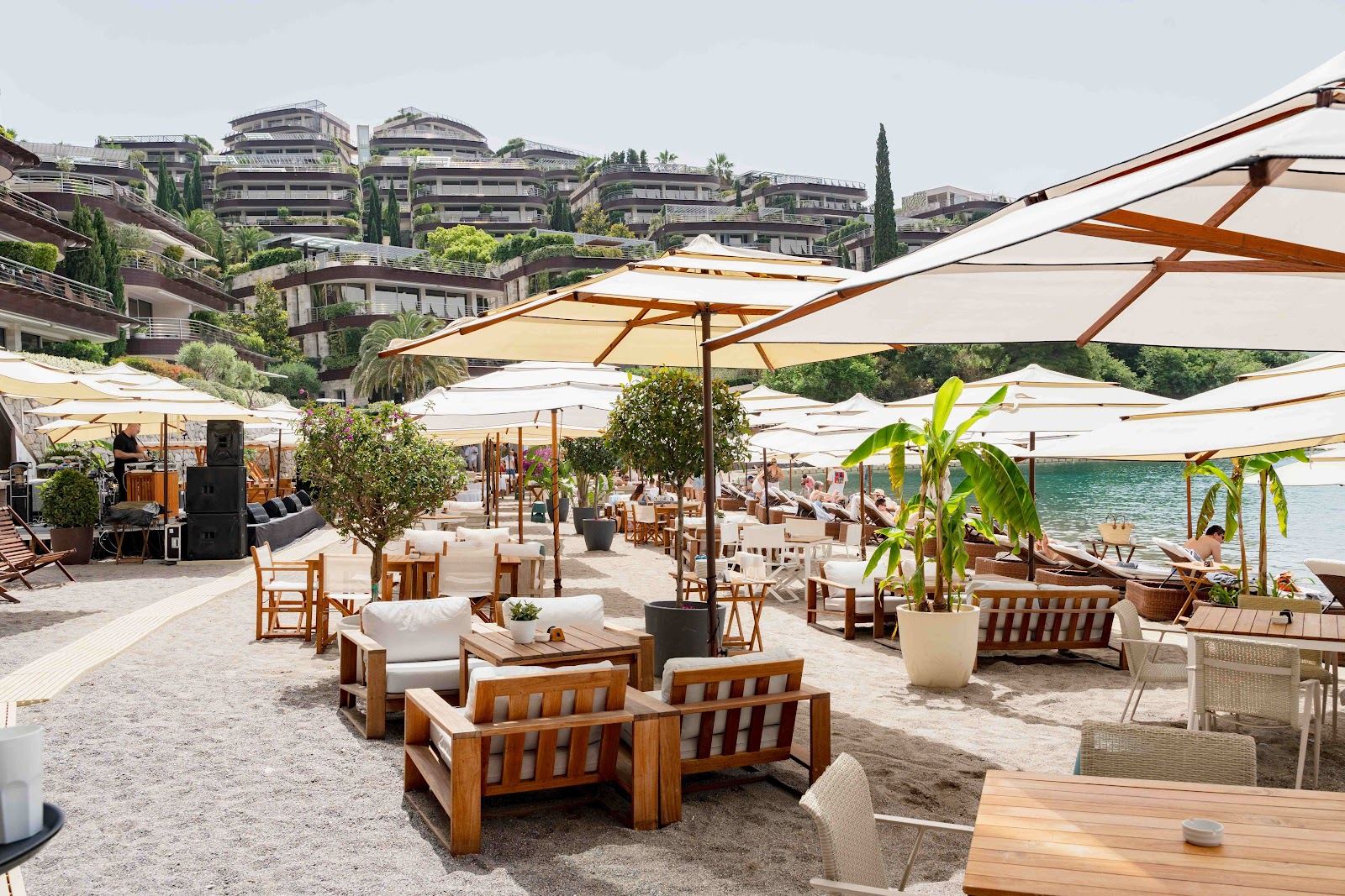 Sunbeds and daybeds at a beach club on the Budva riviera on the Montenegro coast
