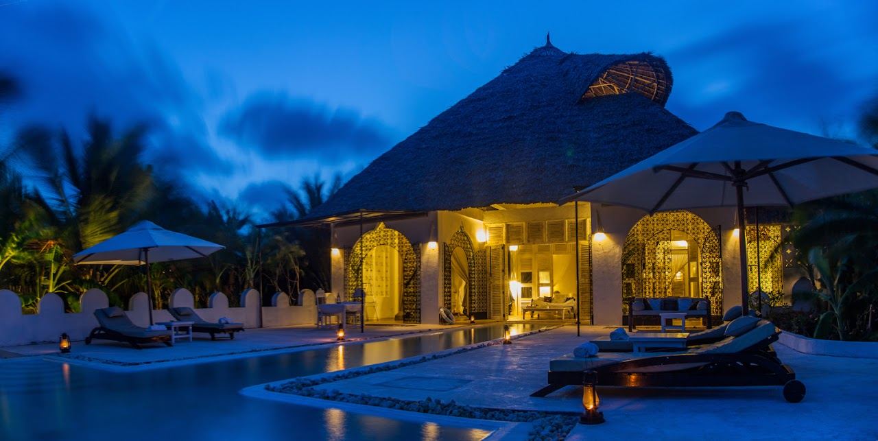 The pale sand, palms and warm shallows of Msambweni Beach on the Kenyan south coast