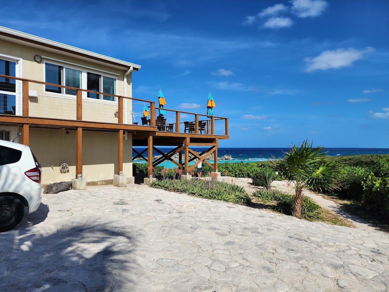 Mudjin Harbour dramatic cliffs and a hidden cove beach nearby on Middle Caicos