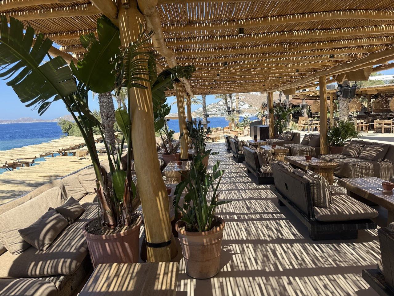 Beach club daybeds in Mykonos and Santorini
