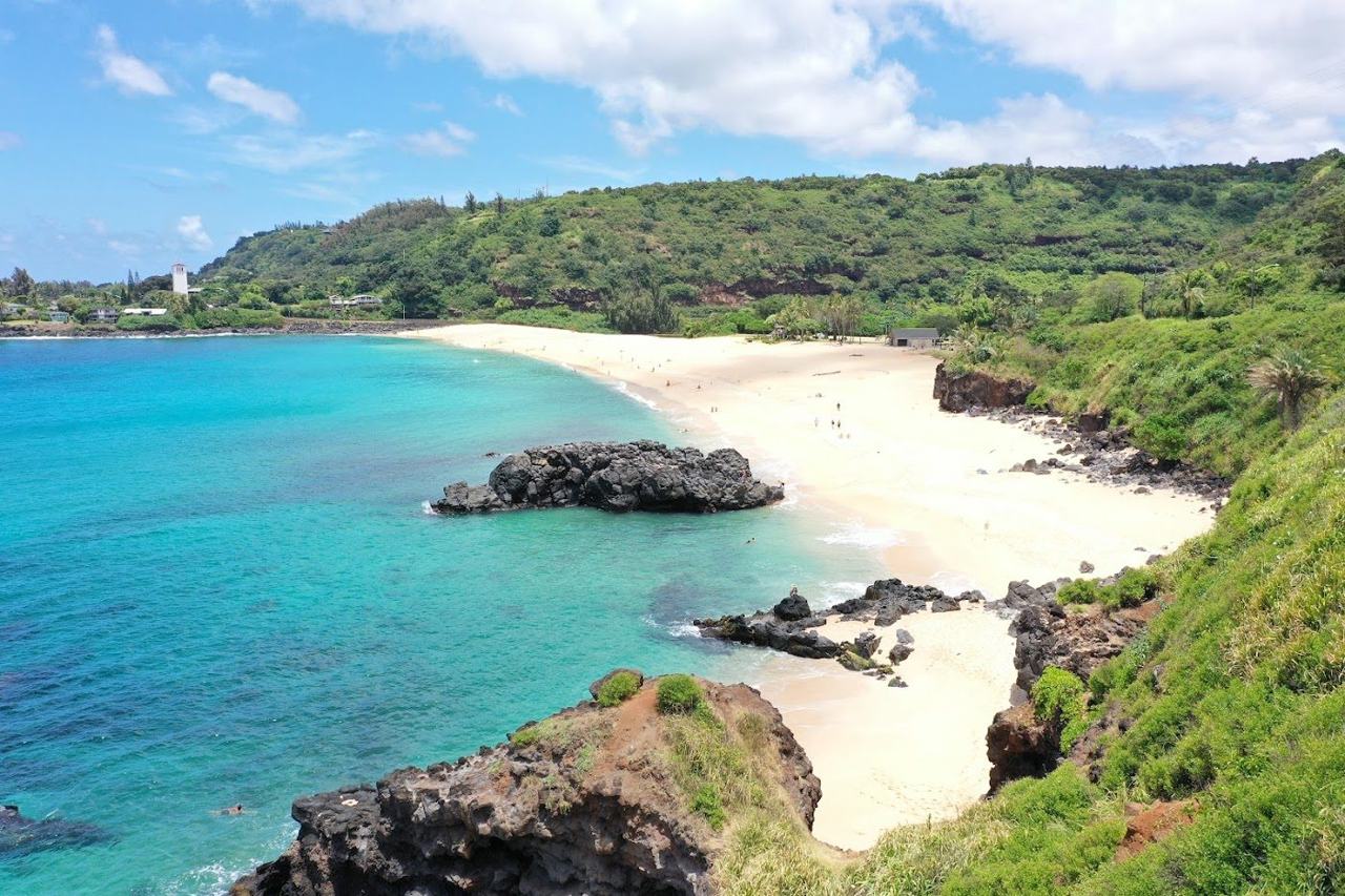 Waimea Bay with its sweep of sand and headland