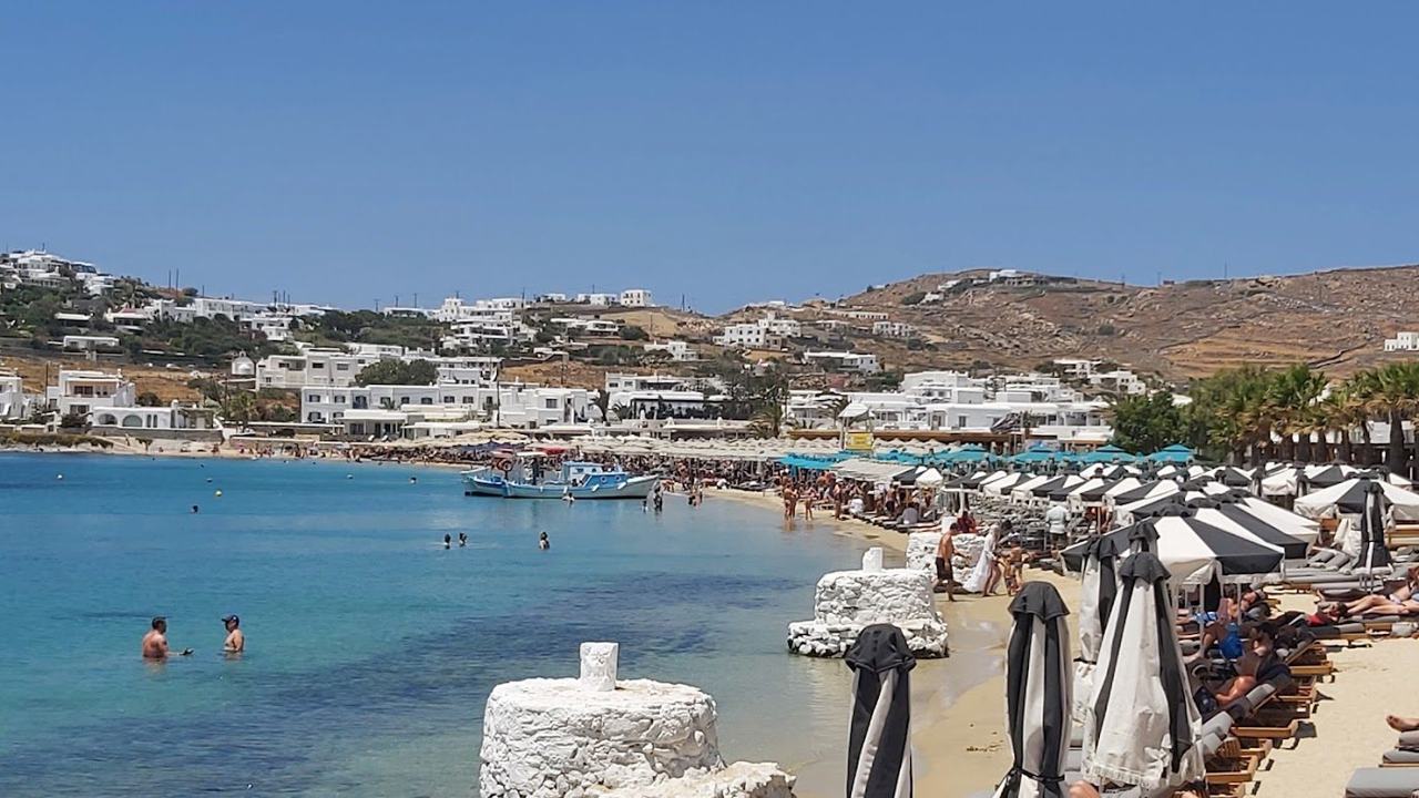 The sheltered sandy bay of Ornos lined with tavernas and hotels close to Mykonos town