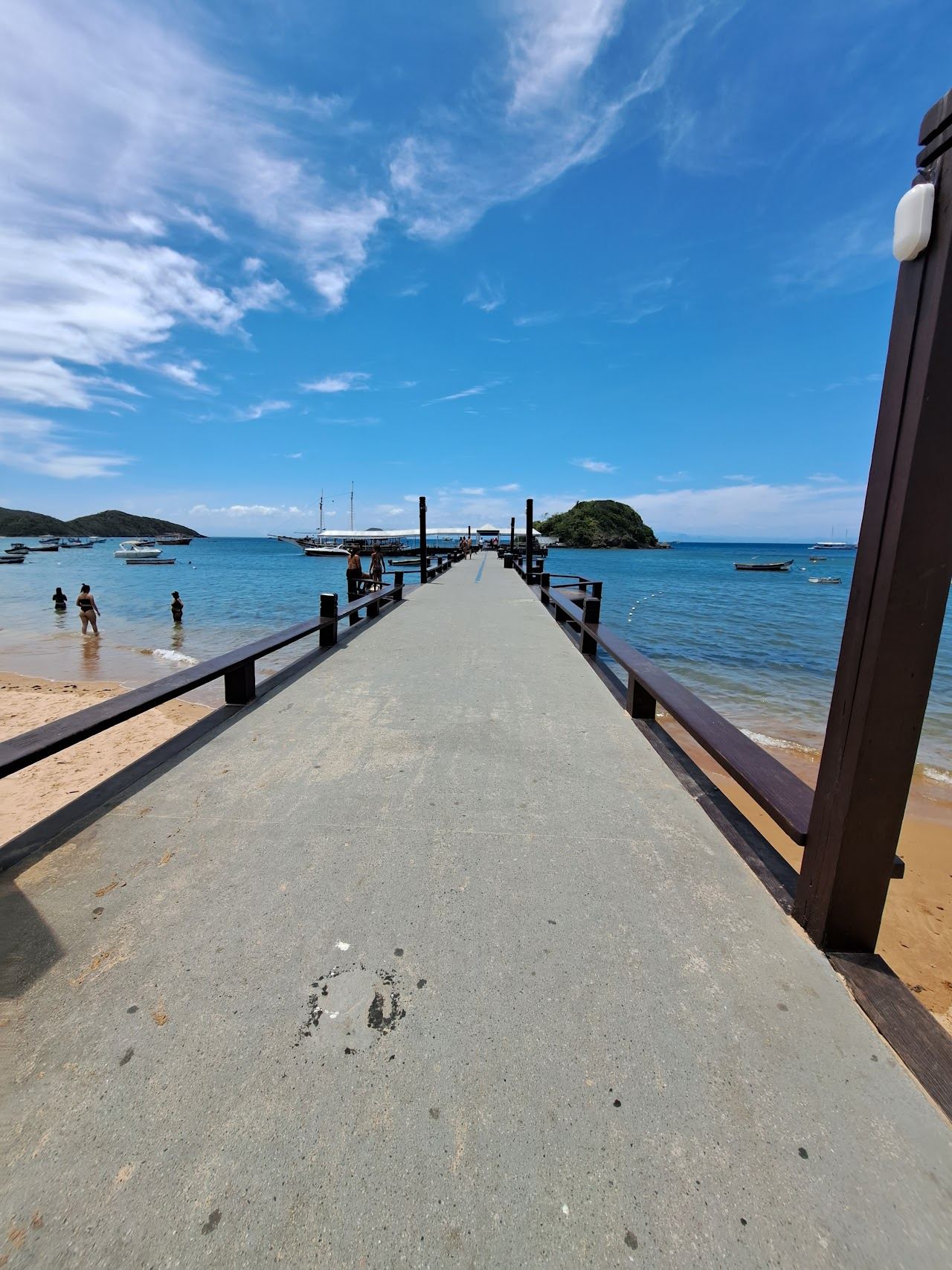 The old harbour bay and waterfront promenade at Ossos Beach in Buzios, Brazil