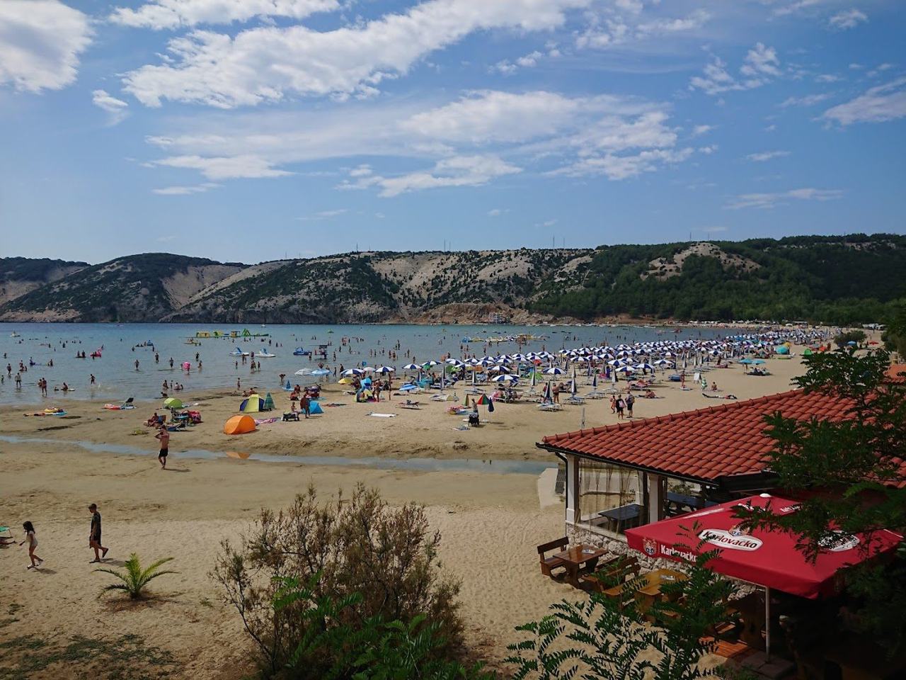 Paradise Beach golden sand and shallow water at Lopar on Rab on the Dalmatian Coast