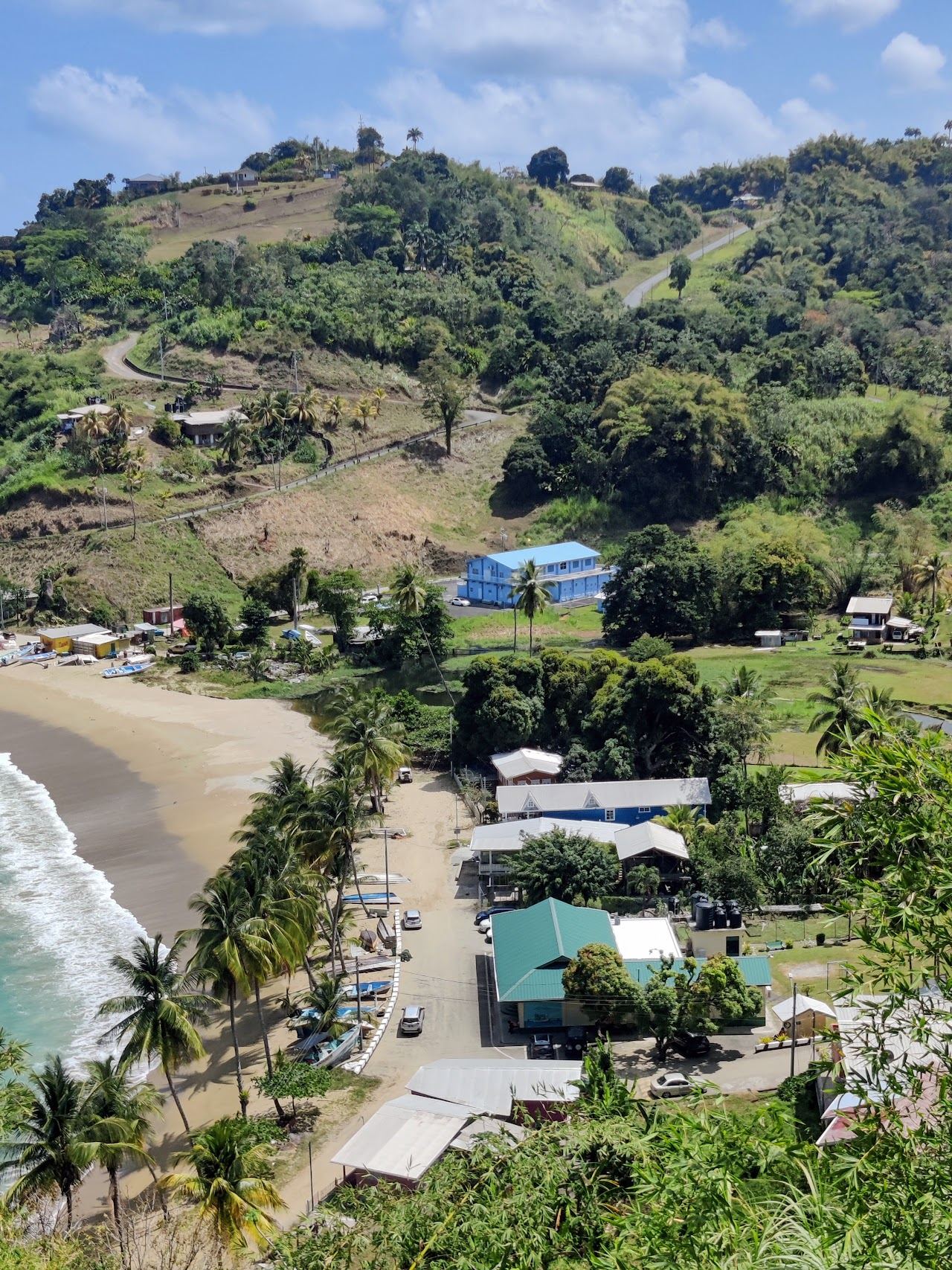The crescent fishing bay and boats at Parlatuvier in Tobago