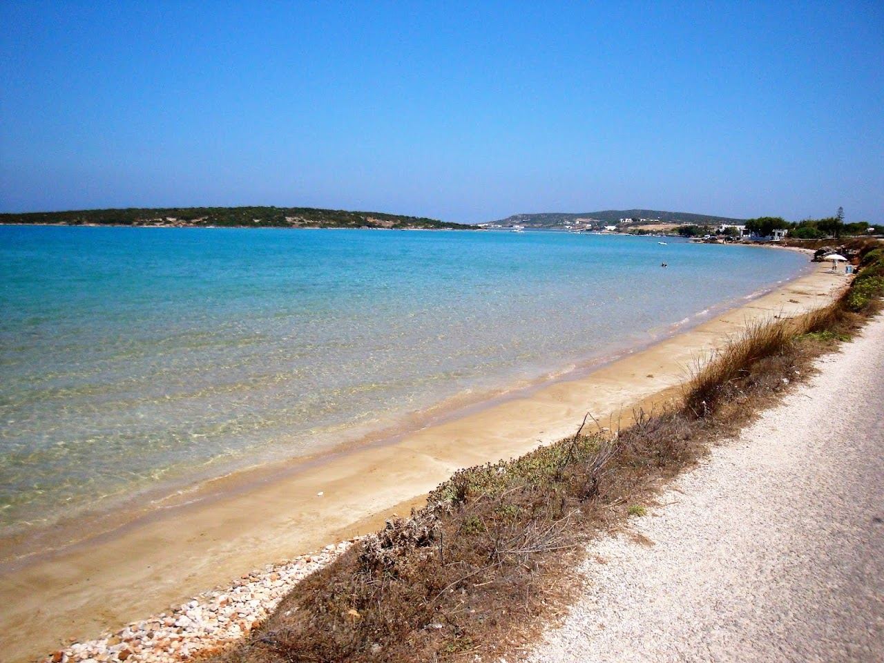 Granite boulders and clear water at a cove in Paros