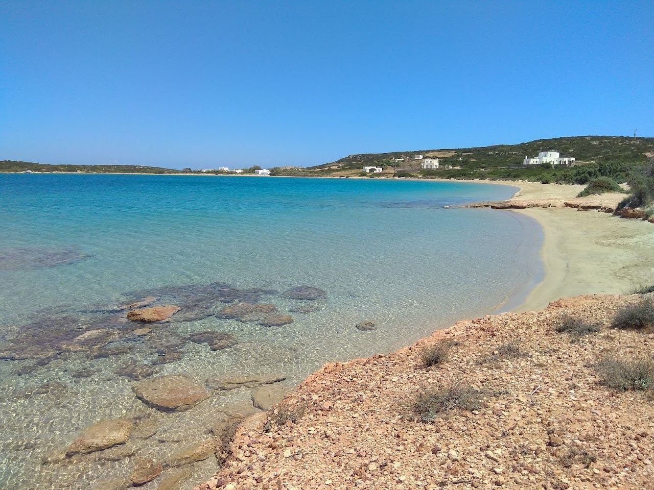 The wide undeveloped golden sand and dunes of Lageri beach between Naoussa and Santa Maria on Paros