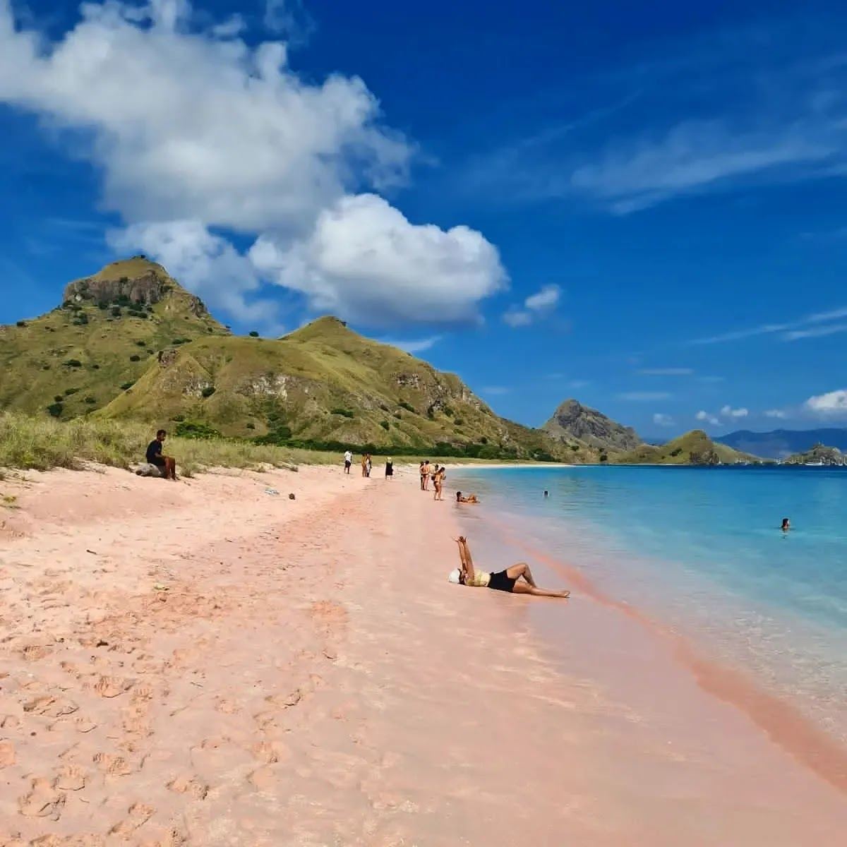 Soft pink tinted sand and clear water at Pink Beach on Komodo Island