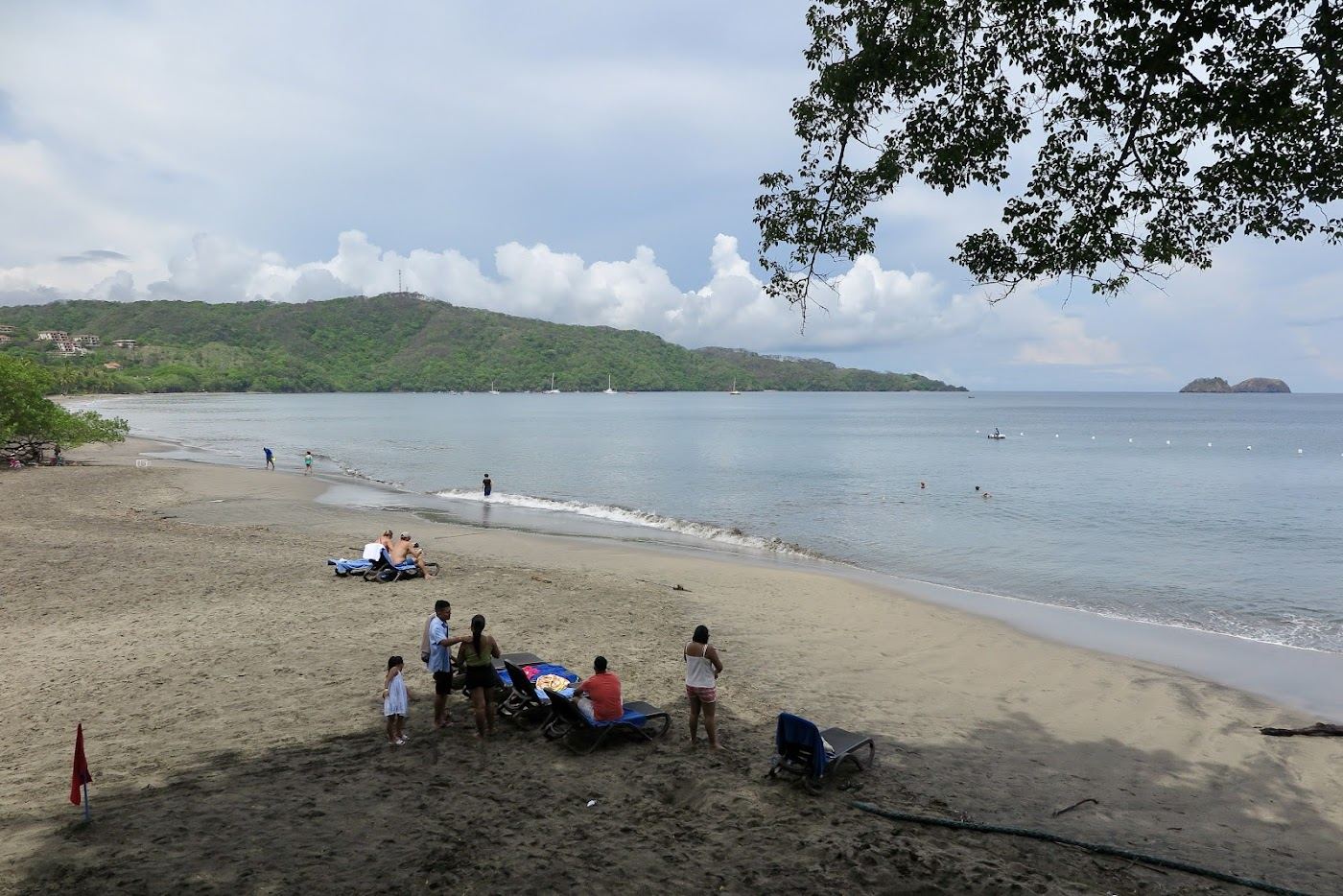 Soft evening light over the calm water of Playa Hermosa near Playas del Coco