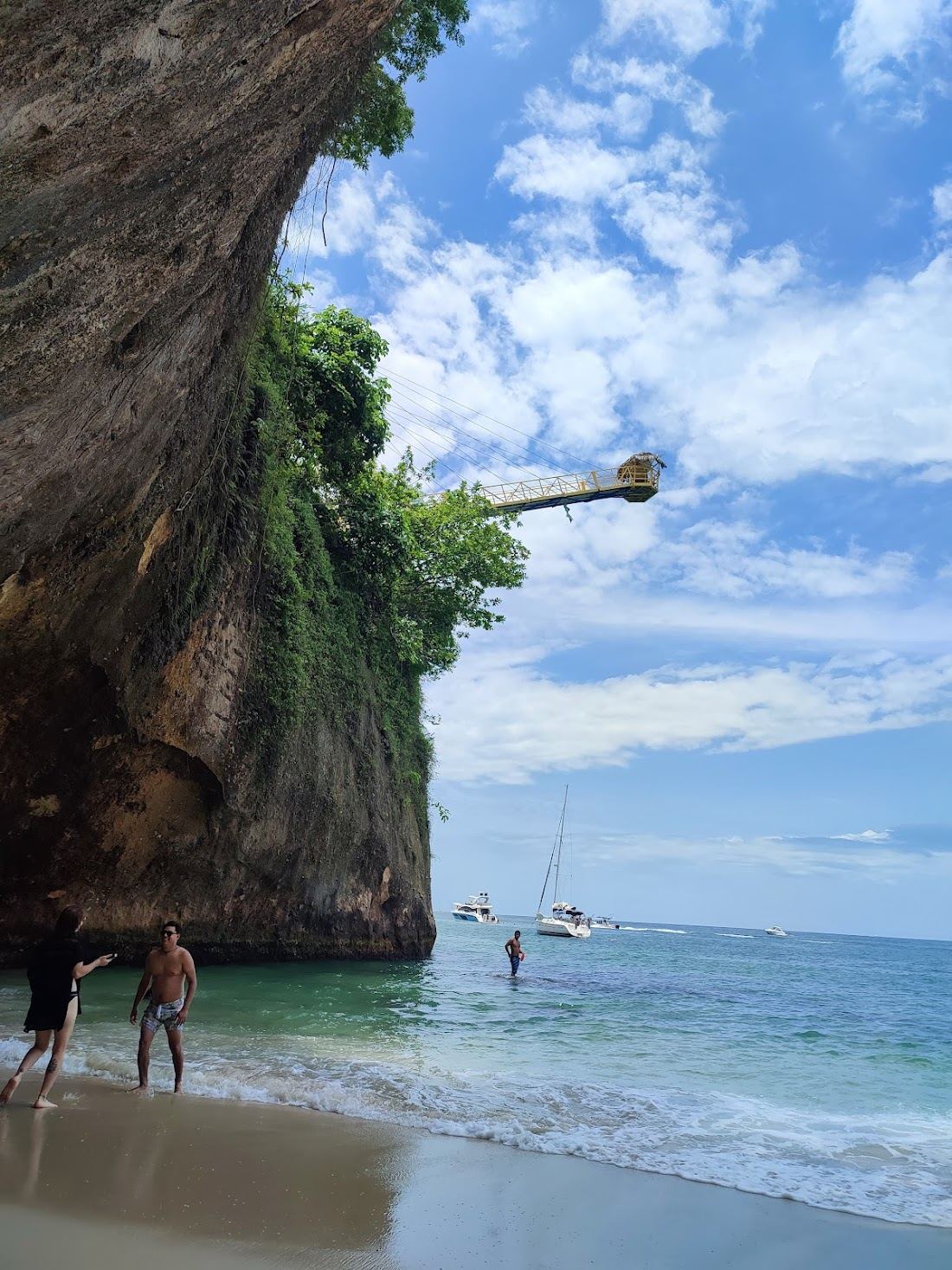 The rocks and clear cove water at Las Gemelas beach near Conchas Chinas